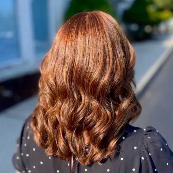 Hair work by By Design Beauty