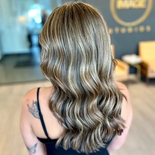 Hair work by By Design Beauty