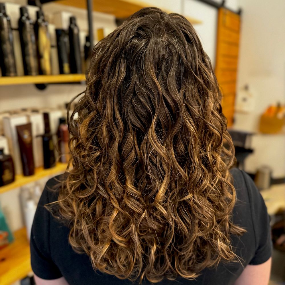 Hair work by Coil & Canvas Hair Studio