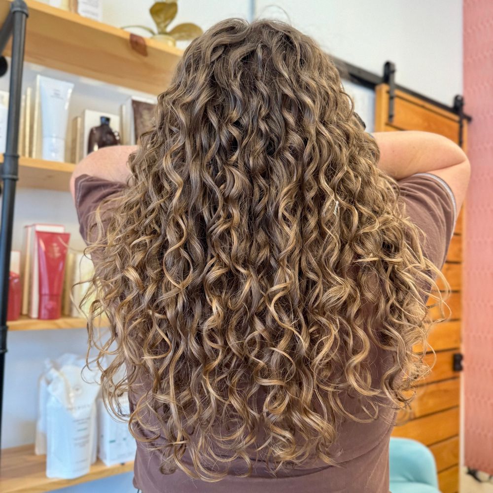 Hair work by Coil & Canvas Hair Studio
