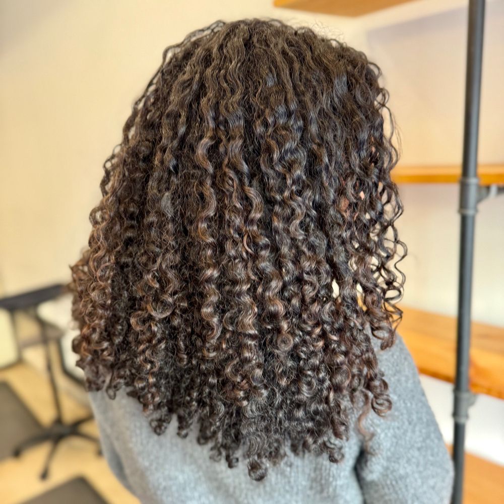 Hair work by Coil & Canvas Hair Studio