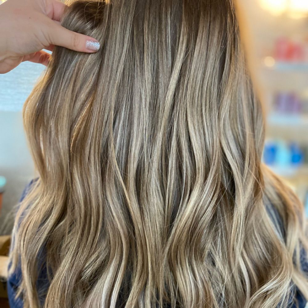 Hair work by Obsidian Salon