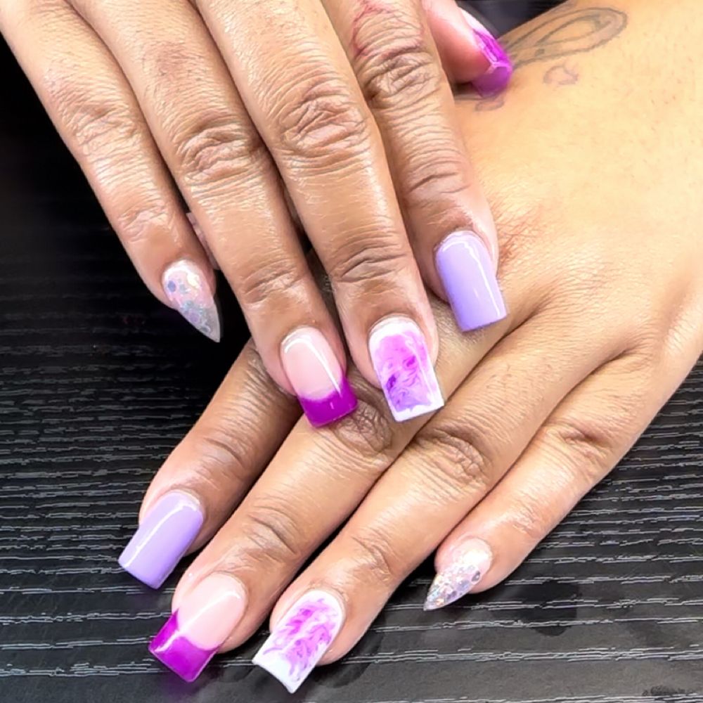 Nail work by Sparkling Tips Studio