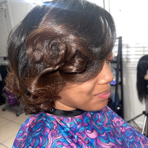 Hair work by Styled By Raven