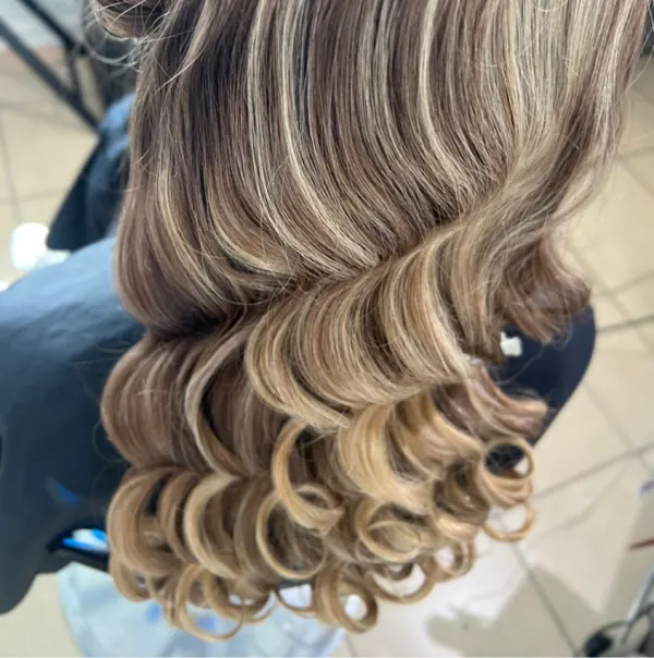 Hair work by Styled By Raven