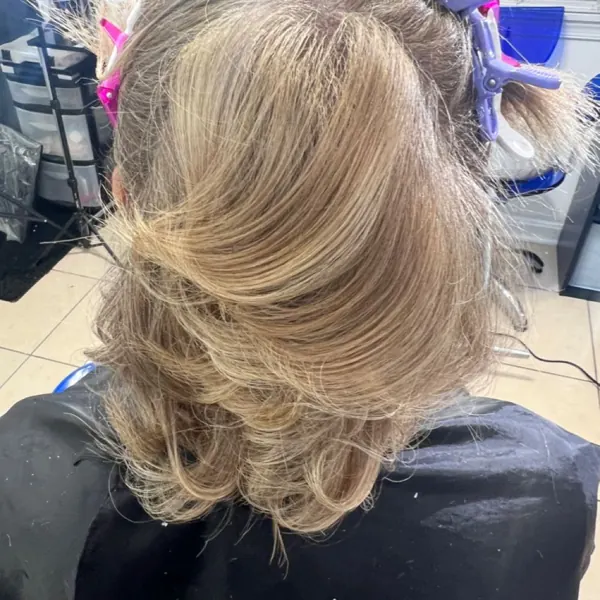 Hair work by Styled By Raven