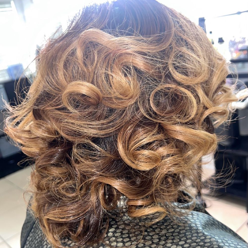 Hair work by Styled By Raven