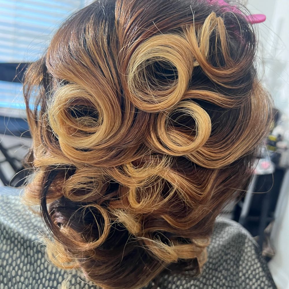 Hair work by Styled By Raven